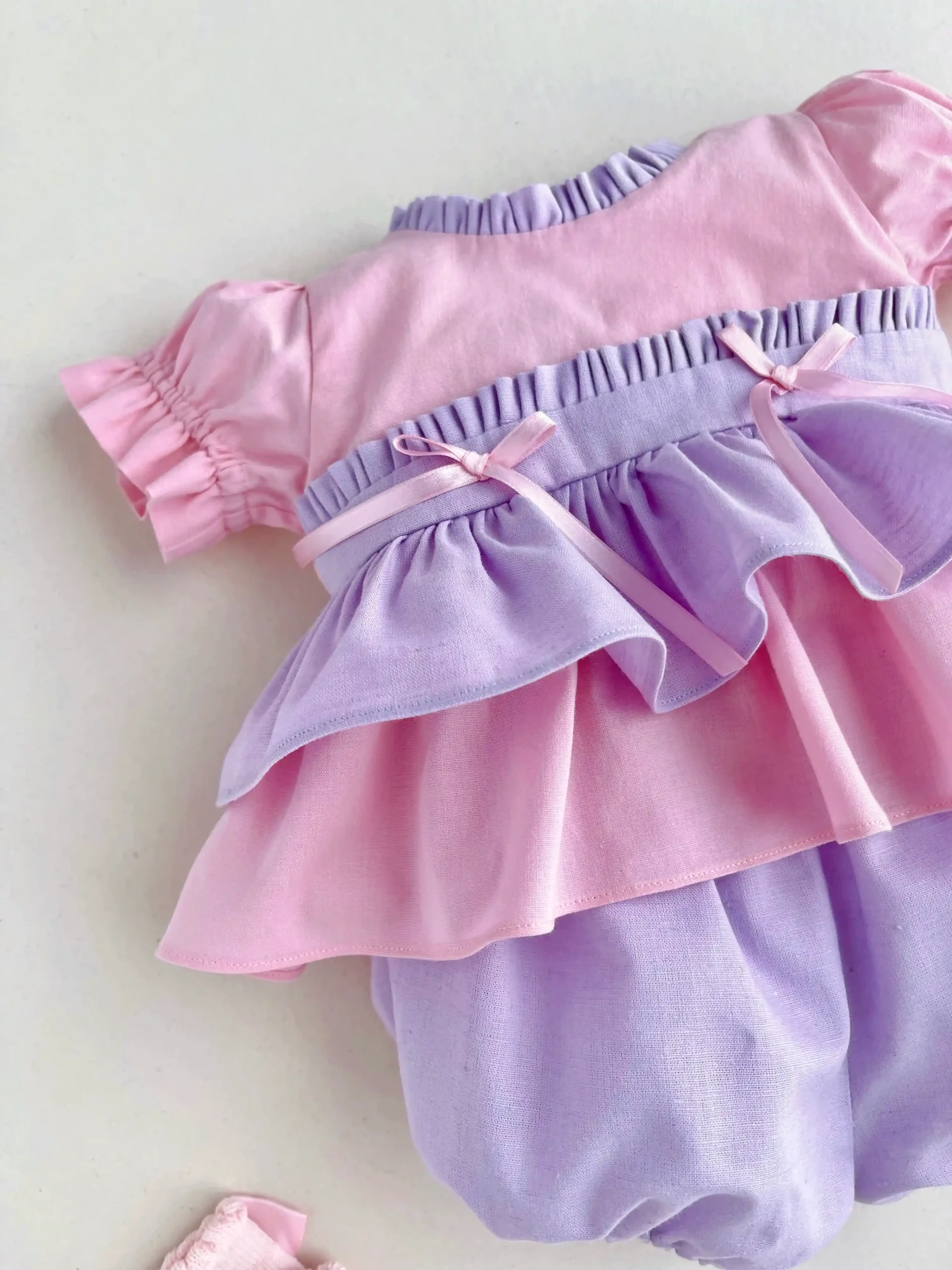 Conjunto rosa y lila para bebé niña