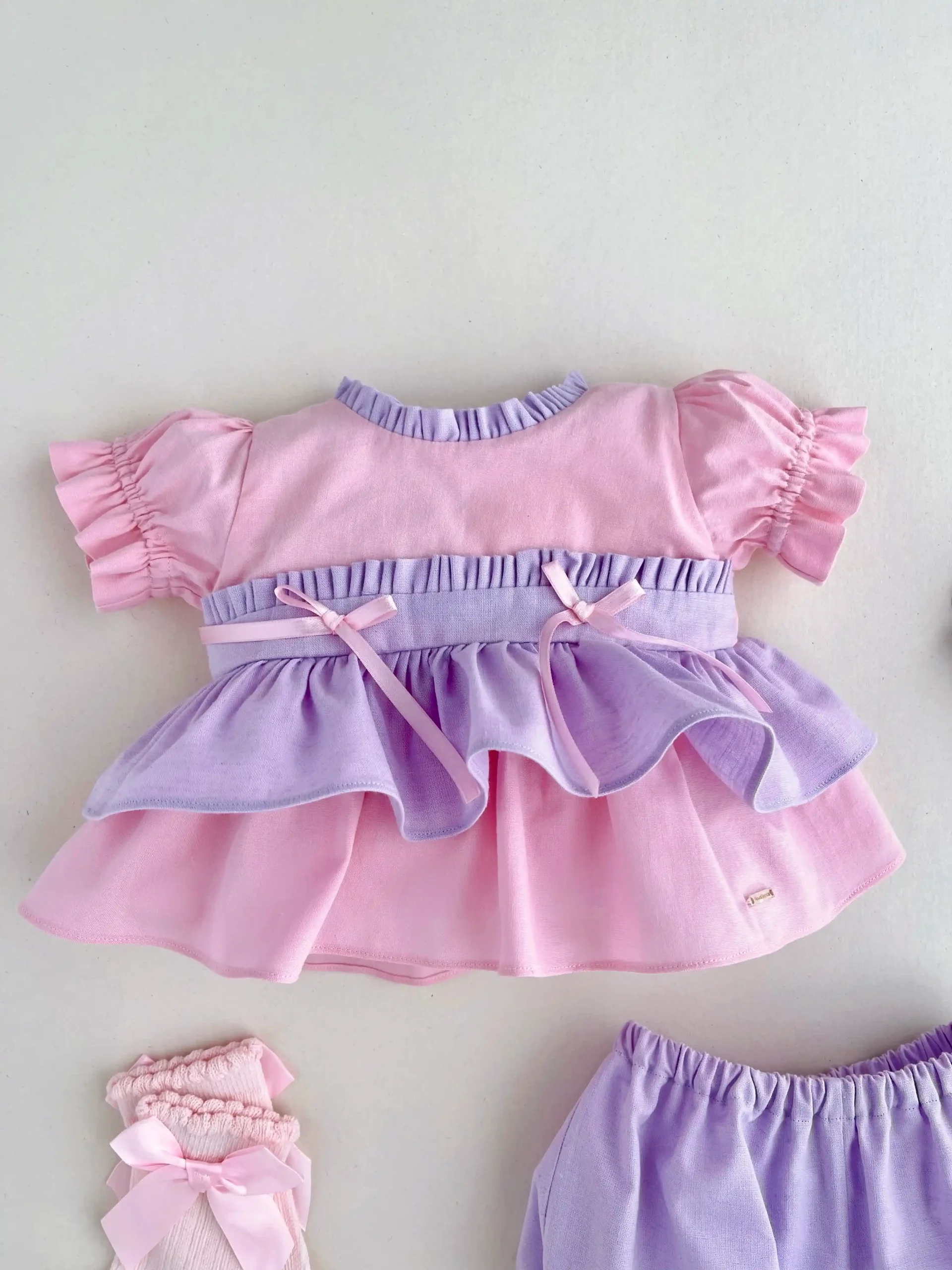 Conjunto rosa y lila para bebé niña