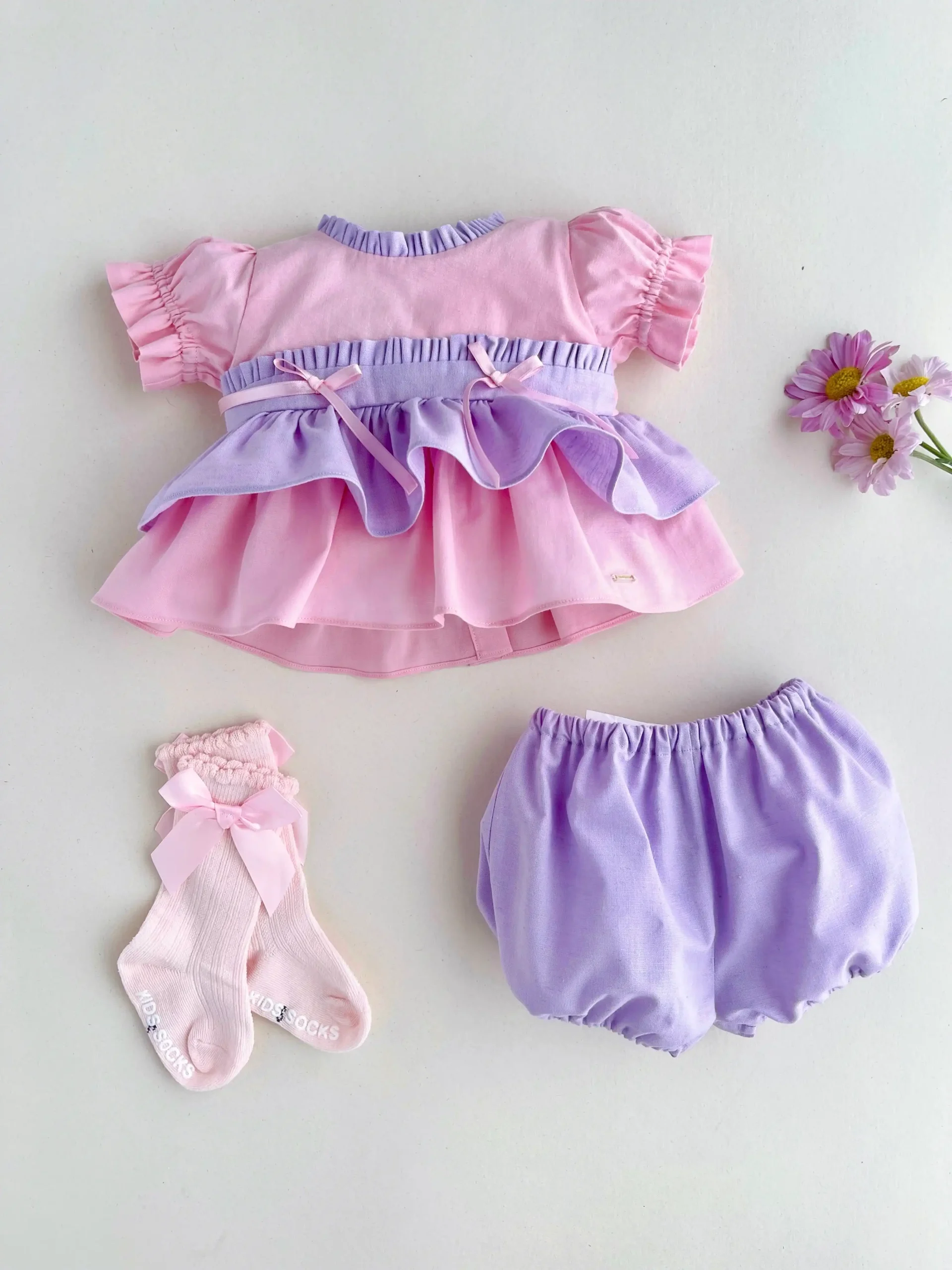 Conjunto rosa y lila para bebé niña